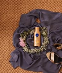 Nivea Spevňujúce tónovacie telové mlieko Q10 Firming + Bronze (Body Lotion) 400 ml