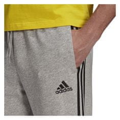 Adidas Nohavice sivá 188 - 193 cm/XXL Essentials Tapered Cuff 3 Stripes