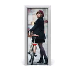 tulup.sk Fototapeta samolepiace dvere žena na bicykli 75x205 cm